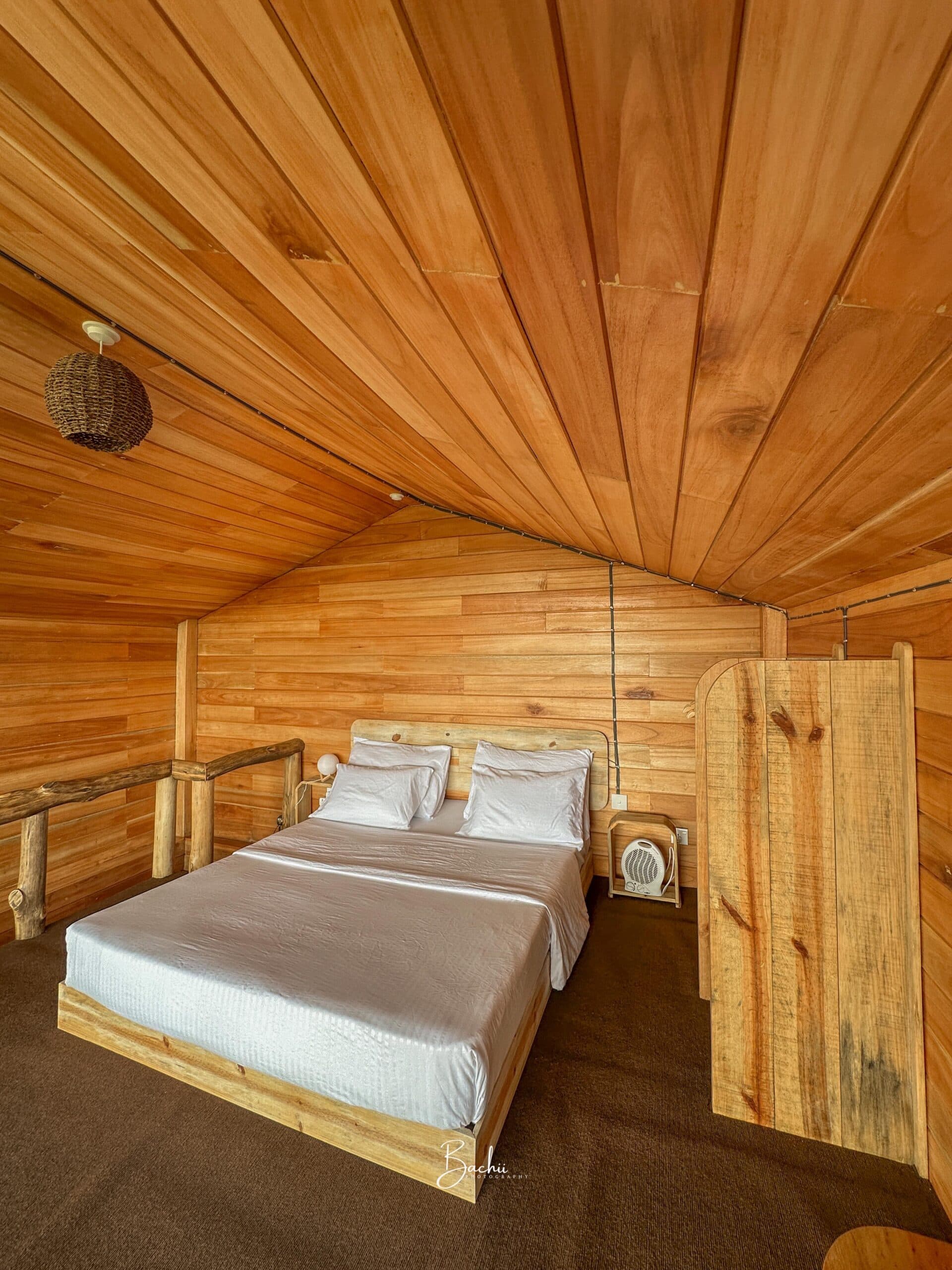 Birdeye cabin — the queen bed on the top floor